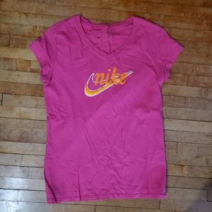 Pink Nike swoosh graphic tee v neck